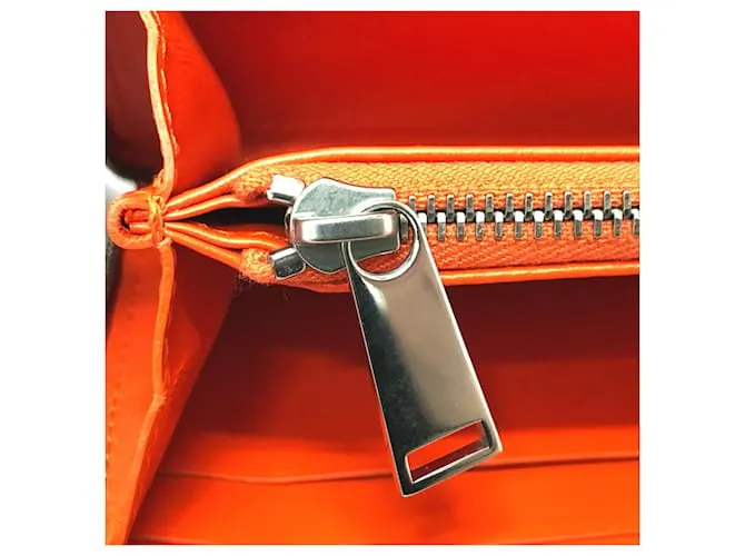 Cartera larga de cuero naranja Bottega Veneta 