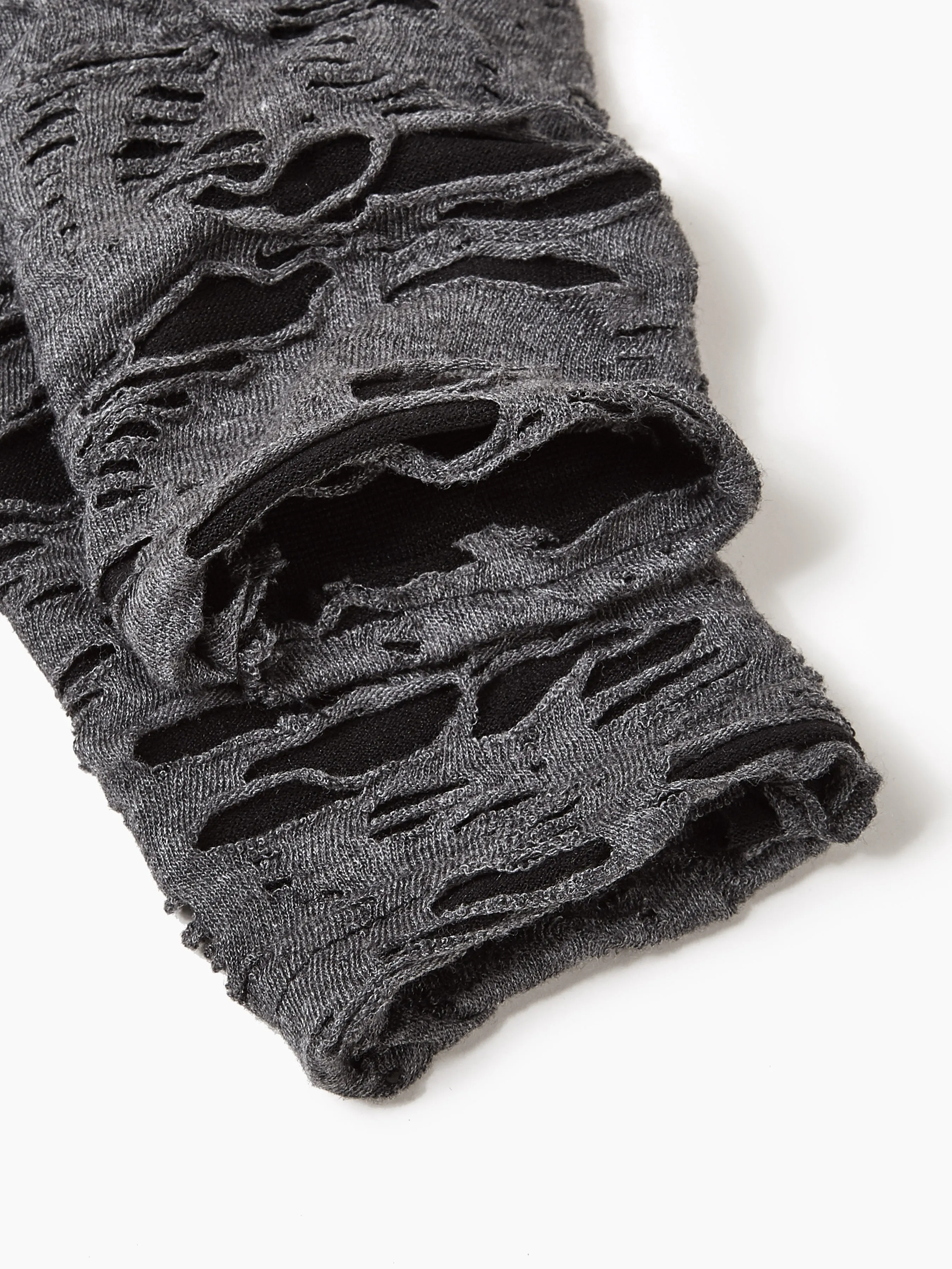 Guantes sin dedos desgarrados