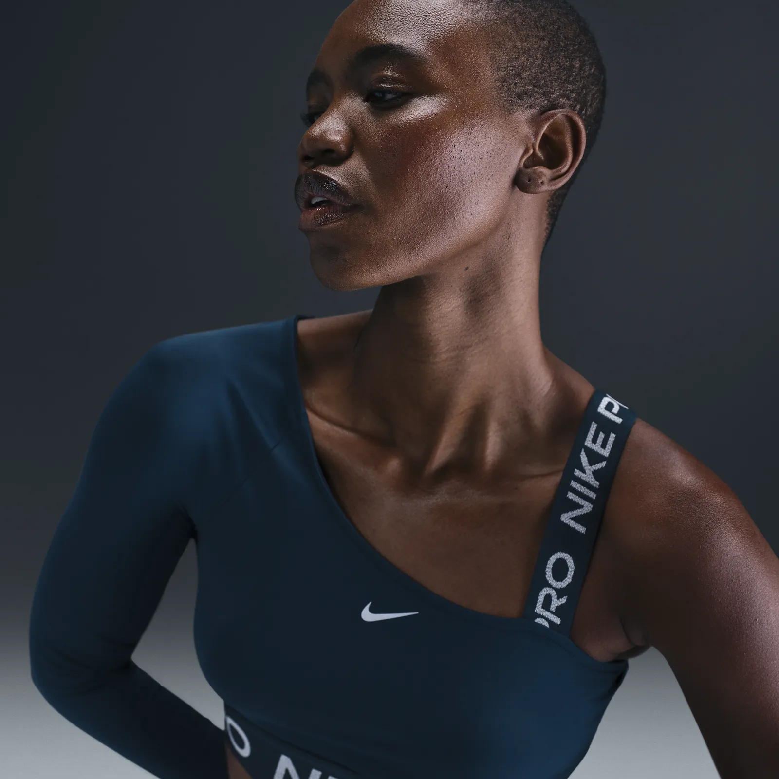 NIKE ASYMMETRIC DRIFIT TOP
