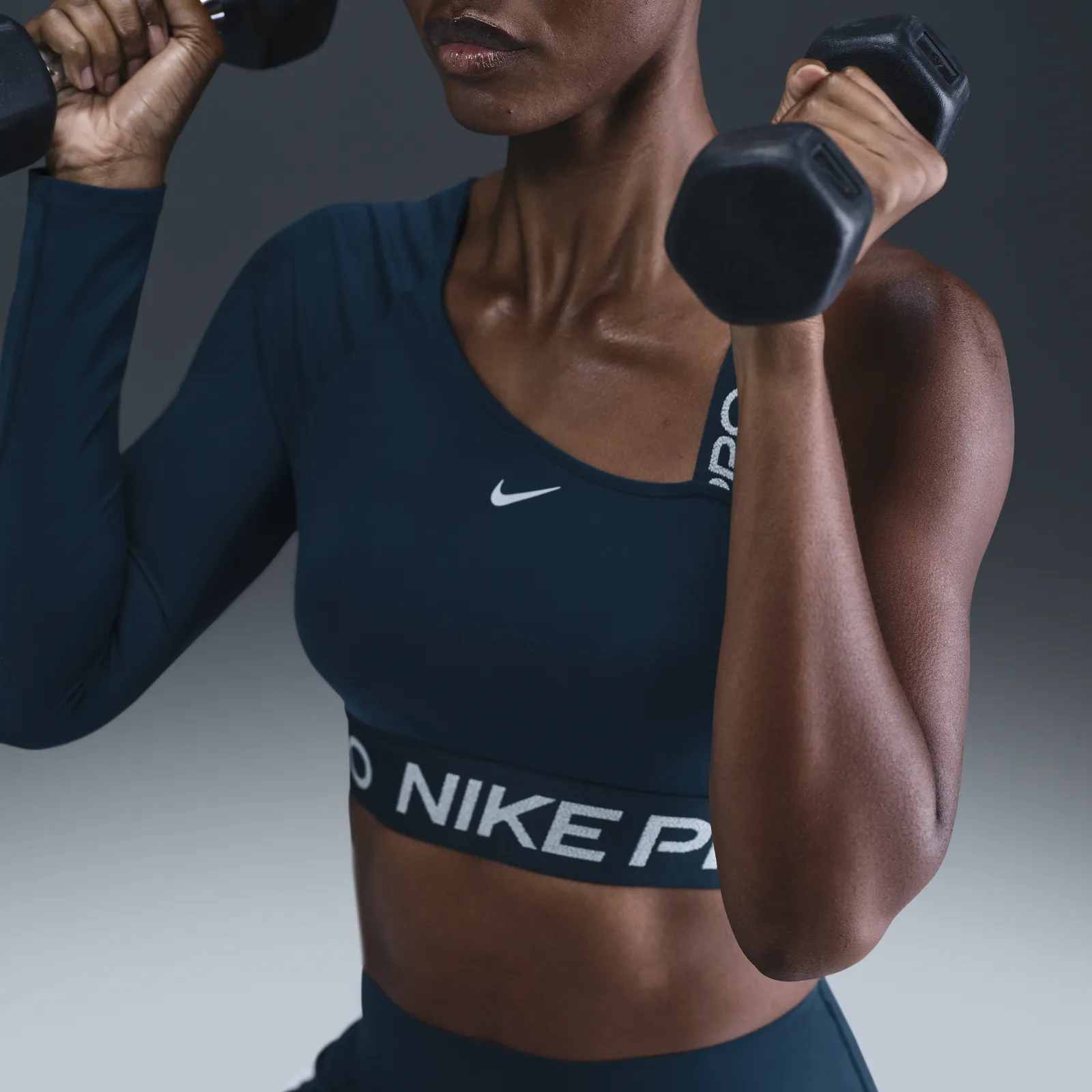NIKE ASYMMETRIC DRIFIT TOP