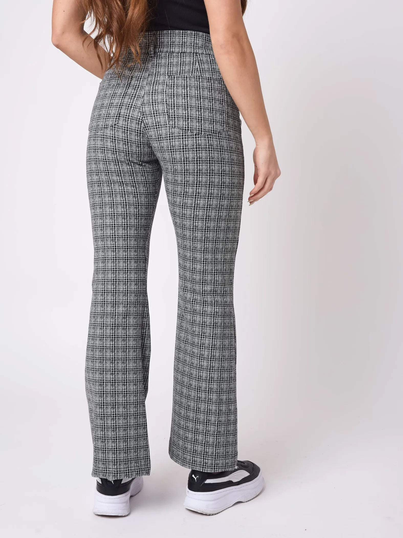 Pantalones acampanados con estampado de cuadros