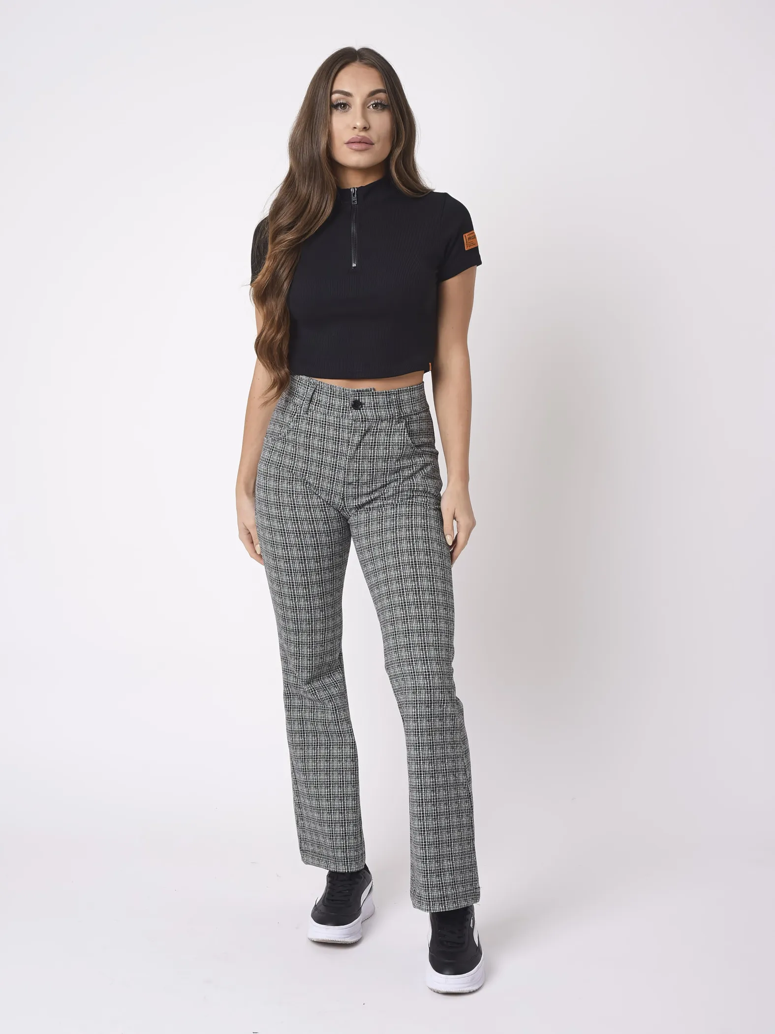 Pantalones acampanados con estampado de cuadros