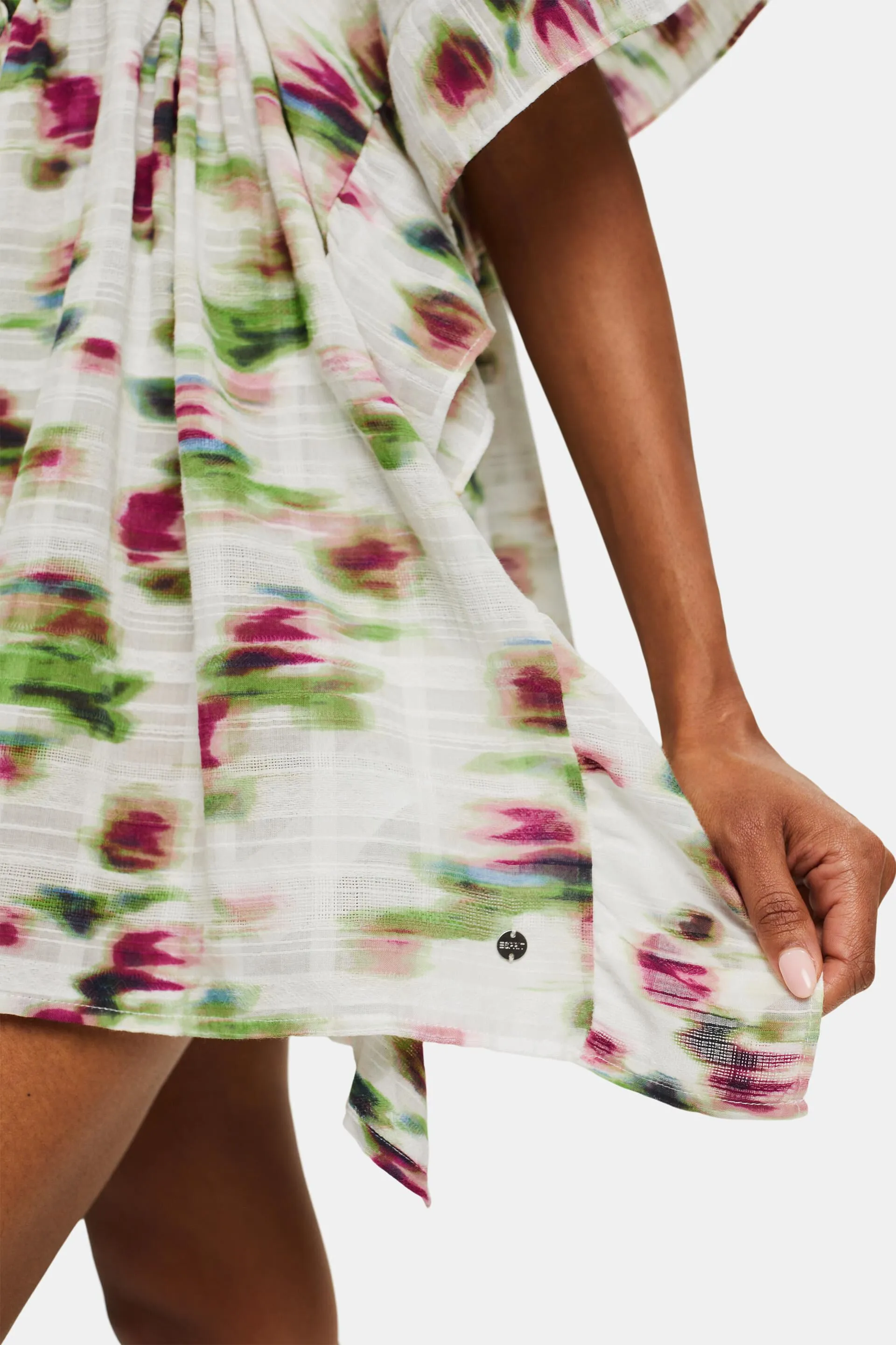 Poncho con textura y estampado