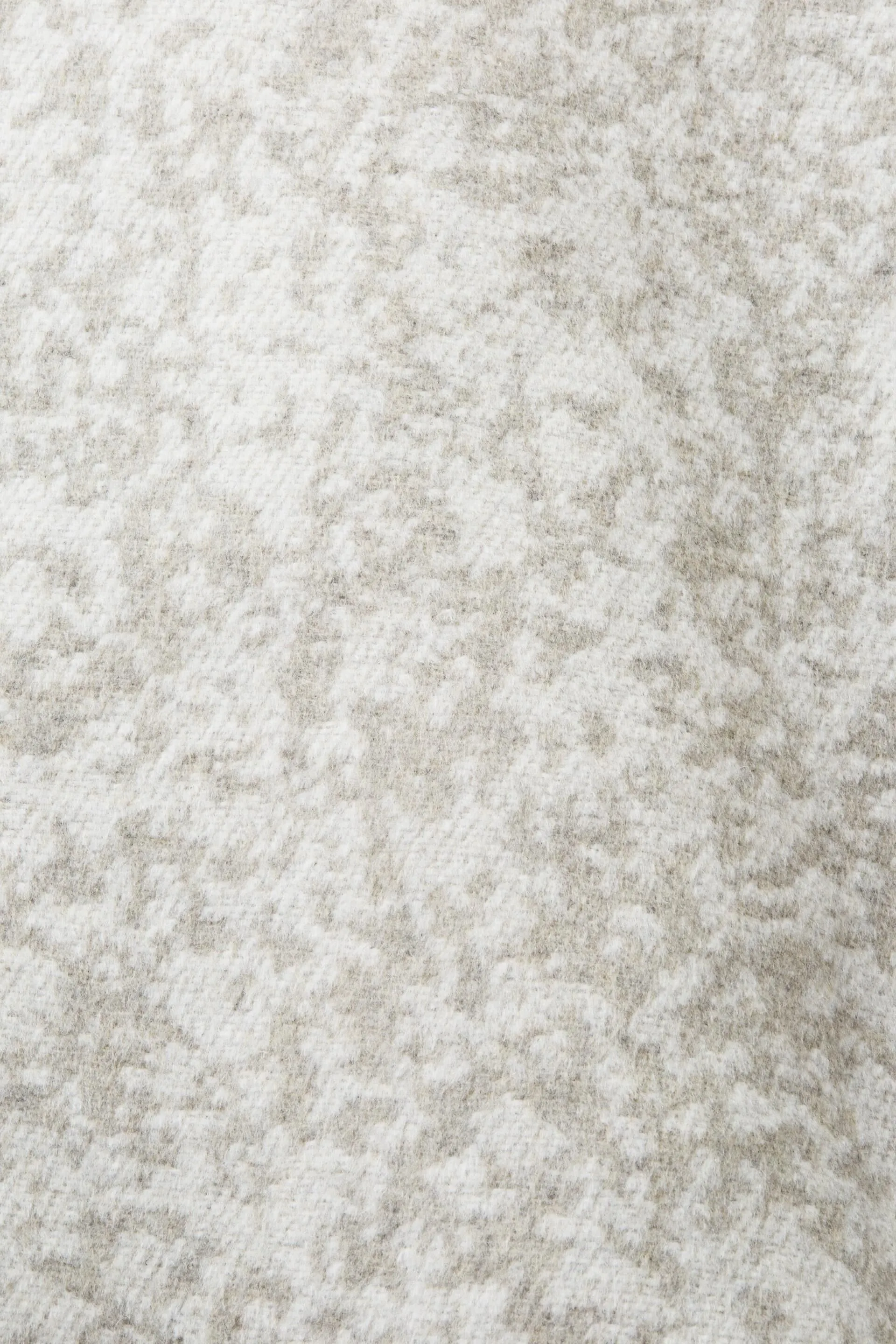 Reciclada: chaqueta larga con textura
