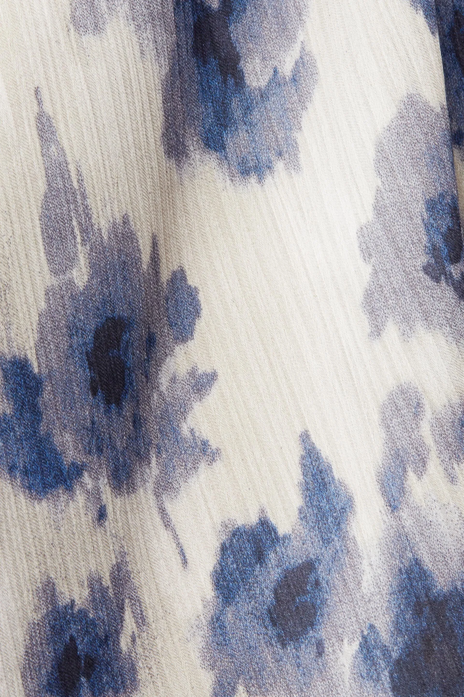 Vestido de mangas abullonadas con estampado floral